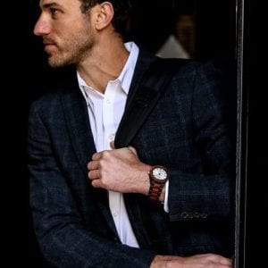 Men in Pose Wearing Custom Engrave Ebony & Rose Wooden Watch
