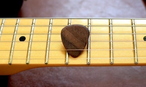 Hardwood Guitar Picks (Set of 4) Dark Pick on Guitar neck