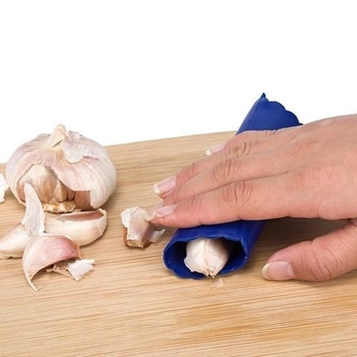 Garlic and Hand on Table