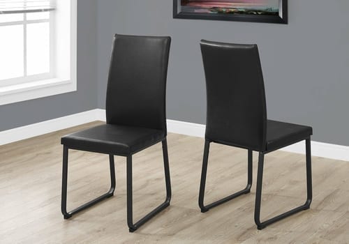 Two Black Faux Leather and Metal Dining Chairs